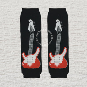 Guitar baby leg warmers with a red and white guitar pattern on a black background