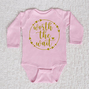 Worth The Wait Long Sleeve Pink Bodysuit